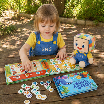 Child learning with Alphabet Busy Book, educational number stickers, and SNS plush toy. Fun and interactive way for kids to enhance literacy, number recognition, and early learning skills outdoors.